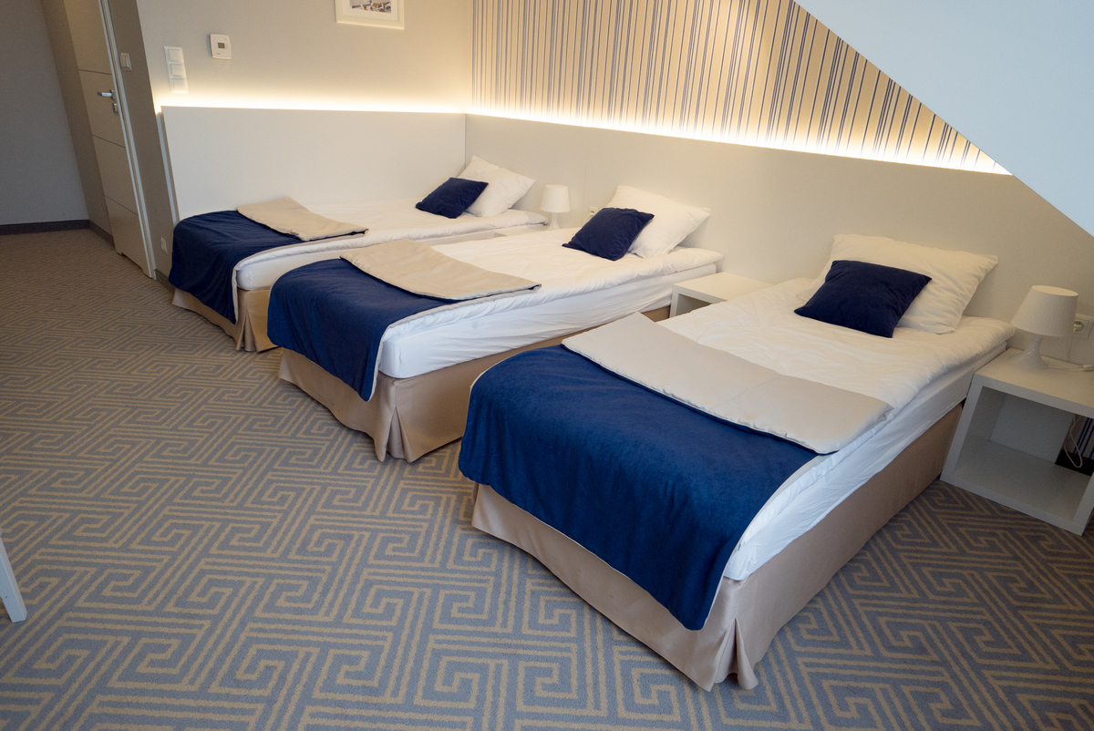 Pokój trzyosobowy z osobnymi łóżkami w Hotelu Aleksandria
